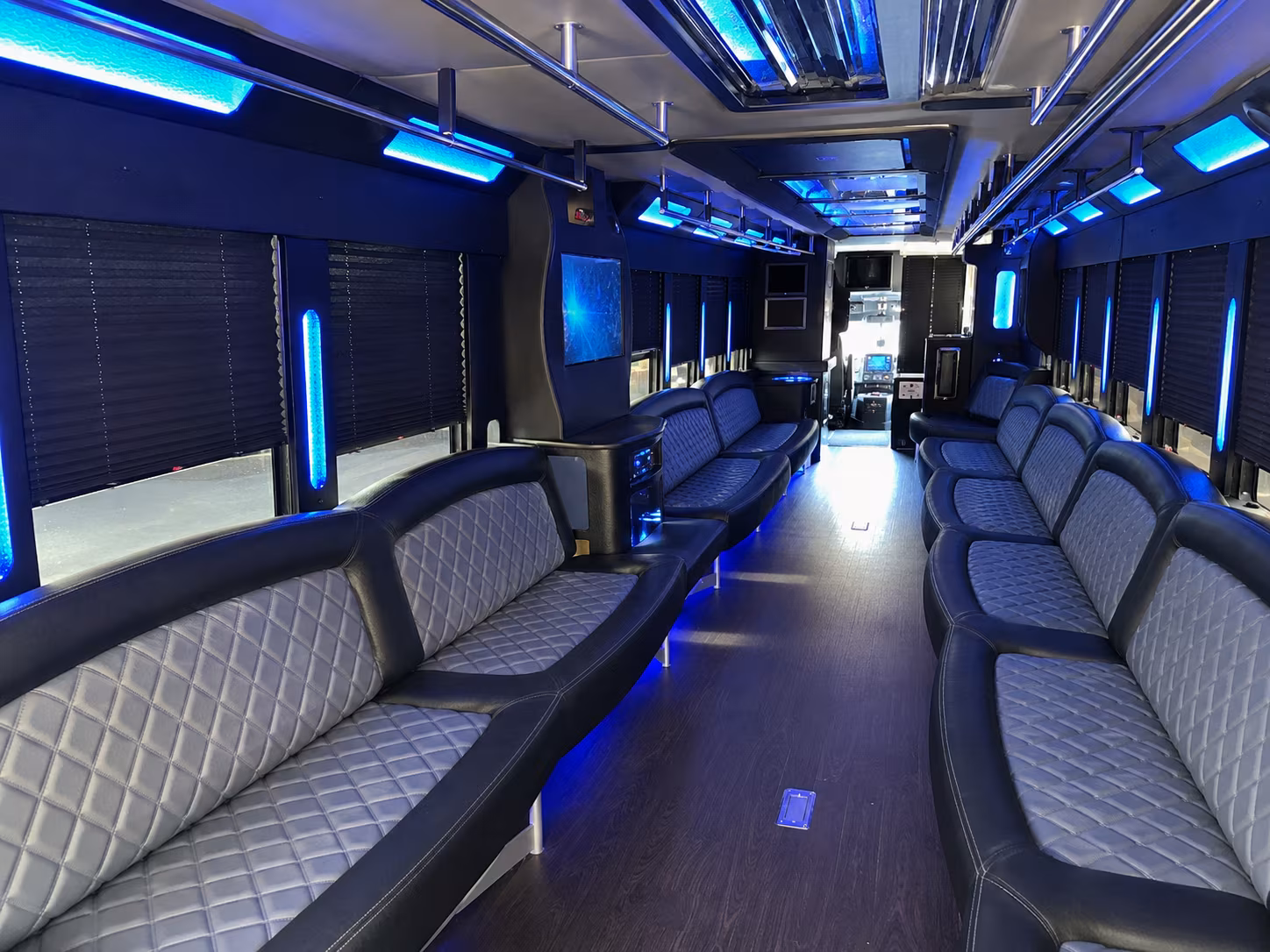 Friends laughing during a party bus celebration in Columbia